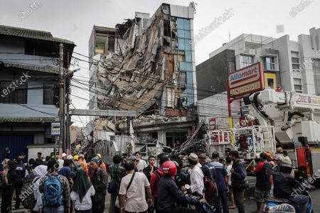 Collapsed 5-storey building: three people injured in Jakarta, Indonesia - 06 Jan 2020